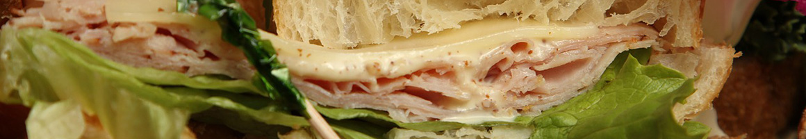 Eating Sandwich at 620 Subs n' Salads restaurant in Boca Raton, FL.